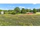 An aerial view of the property showcases the home, silo, and lush surroundings at 4535 N Us Hwy 52, Thorntown, IN 46071