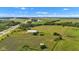 Aerial view of a metal building in a green rural area with a clear blue sky at 4535 N Us Hwy 52, Thorntown, IN 46071