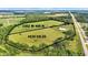 Aerial view of a large lot at 3302 W 450 N and 4535 US-52 surrounded by greenery at 4535 N Us Hwy 52, Thorntown, IN 46071