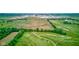 Aerial shot overlooking the verdant golf course, farmland and the surrounding landscape at 4535 N Us Hwy 52, Thorntown, IN 46071