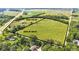 Aerial view of the lot at 4535 US-52 and 3502 W 450 N with a lush green landscape at 4535 N Us Hwy 52, Thorntown, IN 46071