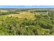 Panoramic aerial view showcasing walking paths amidst lush trees and green pastures at 4535 N Us Hwy 52, Thorntown, IN 46071