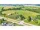 An aerial shot captures the buildings and greenery, with a road running through the property at 4535 N Us Hwy 52, Thorntown, IN 46071