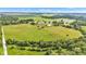 Expansive aerial view featuring pastures, farmland, trees and a road in a tranquil rural setting at 4535 N Us Hwy 52, Thorntown, IN 46071