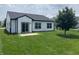 Well-manicured backyard featuring a sliding glass door to the patio at 4726 Deacon Ln, Indianapolis, IN 46237