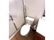 Bright bathroom features a shower with safety bars, toilet, and vanity with storage providing practicality and comfort at 5003 Opal Ridge Ln # 101, Indianapolis, IN 46237