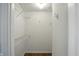 Walk-in closet with built-in shelving offers ample storage space for clothing and accessories at 5003 Opal Ridge Ln # 101, Indianapolis, IN 46237