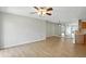 Bright living room with hardwood flooring, neutral walls, and abundant natural light at 5003 Opal Ridge Ln # 101, Indianapolis, IN 46237