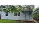 Charming single-Gathering home with a light blue door and a well-maintained lawn at 5344 Fletcher Ave, Indianapolis, IN 46219