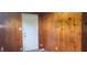 Wood paneling with a white door at 5344 Fletcher Ave, Indianapolis, IN 46219