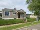 This home boasts a well-maintained lawn, classic architectural details, and easy street access at 602 S Sherman Dr, Indianapolis, IN 46203