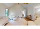 Sun-filled Bedroom featuring a vaulted ceiling, hardwood flooring and an open view to the bathroom at 6115 Stonegate Run, Zionsville, IN 46077