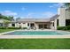 Gorgeous in-ground pool with lounge chairs surrounded by a well-maintained yard, perfect for outdoor enjoyment at 6115 Stonegate Run, Zionsville, IN 46077