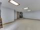 Spacious basement featuring tile floors, recessed lights, and a brick fireplace for cozy gatherings at 6295 State Road 142 Rd, Martinsville, IN 46151