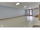 Large finished basement featuring tile floors, recessed lighting, and easy access to the exterior at 6295 State Road 142 Rd, Martinsville, IN 46151