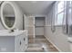Bathroom featuring a modern vanity and mirror plus a window at 6295 State Road 142 Rd, Martinsville, IN 46151