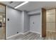 Bedroom with gray walls, recessed lighting, and wood-look flooring at 6295 State Road 142 Rd, Martinsville, IN 46151
