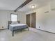 Comfortable bedroom features carpeted floors and closet at 6295 State Road 142 Rd, Martinsville, IN 46151