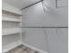 A closet features wood shelving and a hanging bar at 6295 State Road 142 Rd, Martinsville, IN 46151