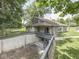Lovely home featuring a large backyard with mature trees and a unique concrete storage area at 6295 State Road 142 Rd, Martinsville, IN 46151