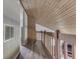 Hallway with wood ceiling and railings at 6295 State Road 142 Rd, Martinsville, IN 46151