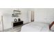 Minimalist bedroom with stylish shelving, modern furniture, and a serene atmosphere at 6580 Halsey St, Zionsville, IN 46077