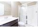 Bathroom featuring a modern vanity, sink, toilet and a fully enclosed shower with glass doors at 6610 Aberdeen Dr, McCordsville, IN 46055