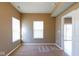 Bright and airy bedroom featuring neutral walls, carpet flooring, and abundant natural light from two large windows at 6610 Aberdeen Dr, McCordsville, IN 46055