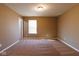 Bedroom featuring plush carpeting, neutral paint, ceiling light, and natural light from window at 6610 Aberdeen Dr, McCordsville, IN 46055