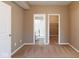 Carpeted bedroom features two doors leading to a bathroom with shower and a walk-in closet at 6610 Aberdeen Dr, McCordsville, IN 46055