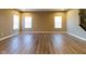 Spacious living room featuring hardwood floors and natural light at 6610 Aberdeen Dr, McCordsville, IN 46055