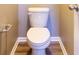 Close-up of toilet featuring updated fixtures and tile flooring at 6610 Aberdeen Dr, McCordsville, IN 46055