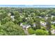 Aerial view of property showcasing landscaping, mature trees, and neighborhood at 6741 Evanston Ave, Indianapolis, IN 46220
