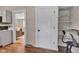 View from kitchen into living room and pantry with built-in shelving at 6741 Evanston Ave, Indianapolis, IN 46220