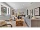 Cozy living room featuring stylish decor, comfortable seating, and plenty of natural light at 6741 Evanston Ave, Indianapolis, IN 46220