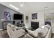 Spacious living room with comfortable seating, fireplace, and natural light creating a relaxing atmosphere at 6838 Cherry Laurel Ln, Fishers, IN 46038