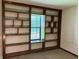 View of the built-in shelving unit at 7042 Colita More Ct, Indianapolis, IN 46254