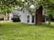 Charming home with large front yard at 7042 Colita More Ct, Indianapolis, IN 46254