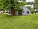 Charming home with large yard and mature trees at 7042 Colita More Ct, Indianapolis, IN 46254