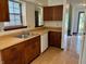 Efficient kitchen with a double sink and ample cabinet space at 7042 Colita More Ct, Indianapolis, IN 46254