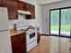 Functional kitchen equipped with modern appliances and ample cabinet storage at 7042 Colita More Ct, Indianapolis, IN 46254