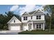 Two story home with brick and vinyl siding, attached two car garage, and gable roof at 740 Milbrodt Dr, Whiteland, IN 46184