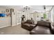 Finished basement featuring seating area, french doors leading to a kitchen area and nearby office at 829 Pioneer Woods Dr, Indianapolis, IN 46224