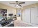 Bedroom with neutral walls, carpeted floors, closet space and access to other living areas at 829 Pioneer Woods Dr, Indianapolis, IN 46224
