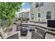 Patio area with a built in fire pit and space to entertain at 829 Pioneer Woods Dr, Indianapolis, IN 46224