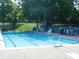 Sparkling community pool featuring a diving board and plenty of seating for residents to relax at 8425 E 82Nd E St, Indianapolis, IN 46256
