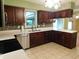 Well-equipped kitchen featuring tile floors, mosaic backsplash and stainless steel appliances at 8425 E 82Nd E St, Indianapolis, IN 46256