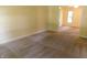 Carpeted living room showcasing bright neutral walls and an open view into a separate dining area at 8425 E 82Nd E St, Indianapolis, IN 46256