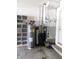 Close-up of new hot water tank, furnace, and filtration system installed in home at 8425 E 82Nd E St, Indianapolis, IN 46256