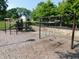 Community playground featuring swings and a climbing structure, perfect for outdoor fun at 8425 E 82Nd E St, Indianapolis, IN 46256